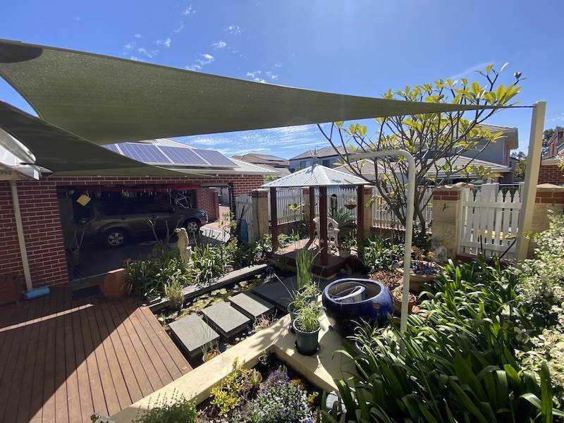 Ascot Shade sails over fish pond Grey Shade Sail in Ascot - Over Fish Pond