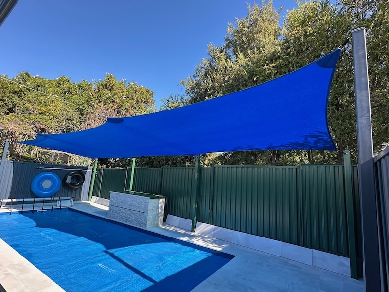 Bateman Shade sail to protect pool from dropping leaves plus shade as well Blue Shade Sail in Bateman over pool